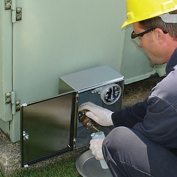 SampleSafe® is a stainless steel locking enclosure that mounts to the outside of a cabinet transformer, away from electrical hazards. Since it allows technicians to safely obtain oil samples without opening the cabinet door, it greatly reduces their exposure to dangerous energized equipment.